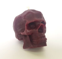 Свеча восковая череп пурпурная средняя